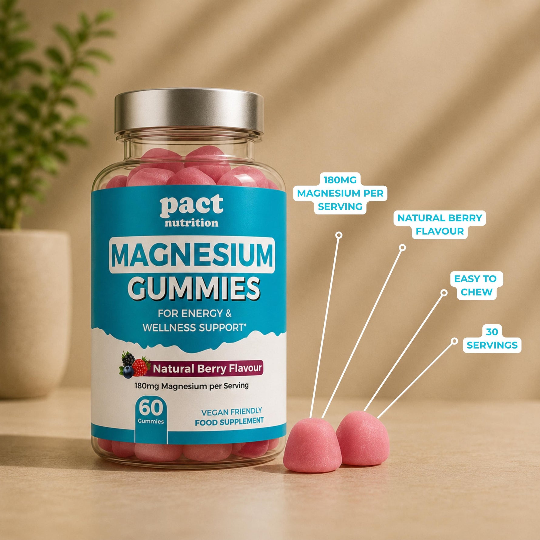 A bottle of Pact Nutrition Magnesium Gummies in natural berry flavour, shown on a wooden surface with two loose gummies in front. White callout lines with text highlight key features: 180mg magnesium per serving, natural berry flavour, easy to chew, and 30 servings.
